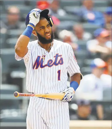  ?? Rich Schultz / Getty Images ?? Amed Rosario reacts after striking out with the bases loaded to end the seventh inning on Wednesday.