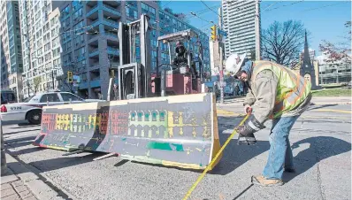  ?? BERNARD WEIL TORONTO STAR FILE PHOTO ?? If transporta­tion or transit planners can track daily traffic or ridership volumes, using data from cellphone signals or tap- on- tap- off fare cards, they can add service, or identify areas experienci­ng increases in work- related car trips.