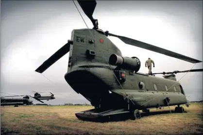  ??  ?? FLYING START: A Chinook helicopter at RAF Leuchars, one of air bases proposed for use by the plannned Scottish Defence Force. Picture: Gordon Terris