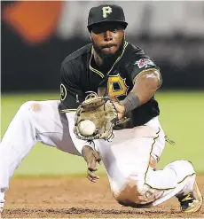  ?? JOE SARGENT/GETTY IMAGES FILES ?? A reporter for the Pittsburgh Post-Gazette says the Toronto Blue Jays have expressed interest in Josh Harrison, who has played at second base, third base and the outfield for the Pirates.