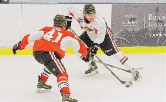  ??  ?? Anthony Louis ( right) said he was the only small guy at his first Blackhawks prospect camp four years ago. “It’s not like that anymore,” he said. | BRIAN JACKSON/ FOR THE SUN- TIMES