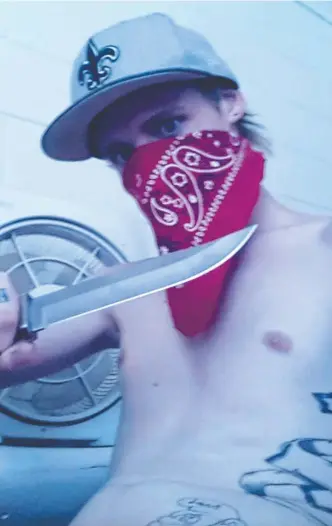  ?? Picture: FACEBOOK ?? Calin McCabe pictured with a large hunting knife.