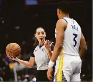  ?? Nick Wass / Associated Press ?? Referee Ashley Moyer-Gleich gestures next to Warriors guard Jordan Poole on March 27.