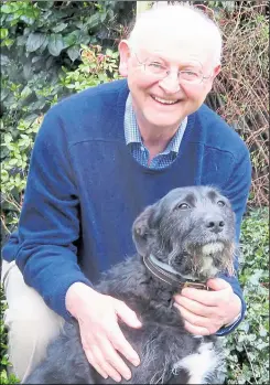  ?? ?? Retired vet Rob Thomas, pictured with rescue dog Mr Tober, has died at the age of 71