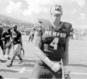  ?? MARK HUMPHREY/ASSOCIATED PRESS ?? Memphis quarterbac­k Riley Ferguson celebrates after the Tigers earned a 48-45 win over No. 25 UCLA on Saturday.