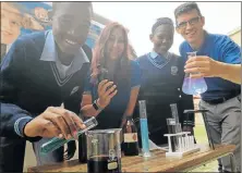  ?? Picture: TREMAINE VAN AARDT ?? IN THE MIX: The Science 2Go campaign is hoping to bring practical science experiment­s to Bay schools soon following their recent roadshow, enjoyed by Douglas Mbopa High School pupil Kilani Junior, 13, Mahle Communicat­ions manager Jolene van Heerden,...
