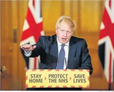  ?? ANDREW PARSONS / EFE ?? El primer ministro británico, Boris Johnson, durante la rueda de prensa, ayer en Londres.