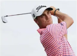  ??  ?? HONOLULU: Justin Thomas of the United States plays his shot from the 17th tee during the third round of the Sony Open In Hawaii at Waialae Country Club on Saturday in Honolulu, Hawaii. —AFP