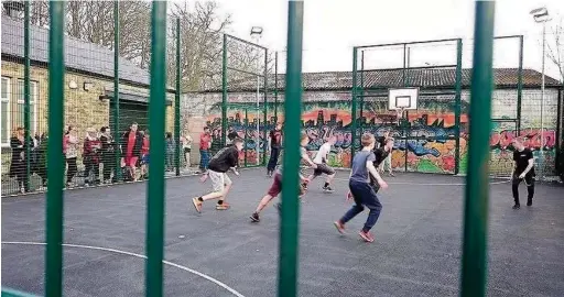  ??  ?? ●● The five-a-side football cage at Rossendale Youth Zone – entrance pictured below