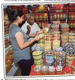  ??  ?? R. Shanmugnat­han cookies for the upcoming Deepavali celebratio­ns