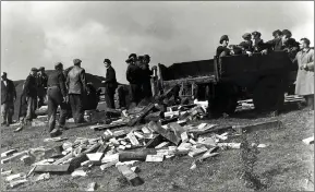  ??  ?? The miners were saved after three days – and were brought up one man at a time, while rescuers and volunteers worked tirelessly on the surface