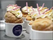  ?? ERIC RISBERG/AP ?? Strawberry Pocky Cruffins are displayed at the Sunday Bakeshop in Oakland, California. The bakery also offers dim sum cookies, among other confection­s.