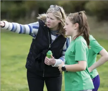  ??  ?? Sinead Wall gives some pre-race advice to Naomi Wall in Roundwood. Photos: Barbara Flynn