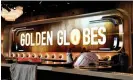  ?? Photograph: Ashley Landis/AP ?? Crews set up a ballroom during the Golden Globe Awards Press Preview for 2024