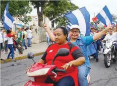  ?? — Reuters ?? Supporters of Nicaragua’s President Daniel Ortega take part in celebratio­ns to mark the 39th anniversar­y of the “Repliegue” (Withdrawal) in Managua, Nicaragua on Saturday.