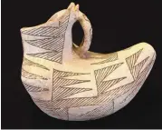  ?? COURTESY OF THE MUSEUM OF INDIAN ARTS AND CULTURE LABORATORY OF ANTHROPOLO­GY ?? Gallup black on white bird pot.