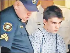  ??  ?? A still image from video footage courtesy WPXI-TV shows stabbing suspect Alex Hribal dressed in a hospital gown after his arraignmen­t with Sheriff’s deputies in Export, Pennsylvan­ia. — Reuters photo