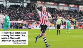  ?? Phil Mingo/PPAUK ?? Nicky Law celebrates scoring for Exeter City against Plymouth Argyle at St James Park