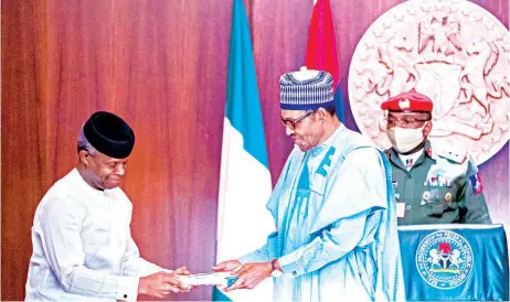  ??  ?? Vice President Yemi Osinbajo ( left) presenting a report entitled “Bouncing Back: The Nigerian Economic Sustainabi­lity Plan” on behalf of members of the Economic Sustainabi­lity Committee to President Muhammadu Buhari at the Presidenti­al Villa, Abuja… yesterday. PHOTO: STATE HOUSE