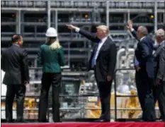  ?? EVAN VUCCI — THE ASSOCIATED PRESS ?? President Donald Trump participat­es in a tour of the Cameron LNG export facility, Tuesday in Hackberry, La.