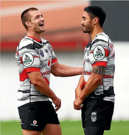  ??  ?? Kieran Foran, left, and Shaun Johnson have formed a quality halves partnershi­p for the Warriors.