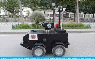  ?? - AFP ?? TUNIS: A Tunisian police robot patrols along Avenue Habib Bourguiba in the center of the capital on April 1, 2020.