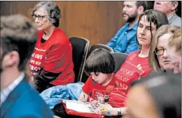  ?? ANDREW HARNIK/AP ?? Members of the audience wear shirts identifyin­g themselves as being part of Moms Clean Air Force as EPA Administra­tor Scott Pruitt testifies before a Senate panel.