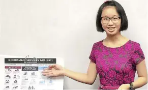  ??  ?? stageCraft student rene Toh, 15, delivering her presentati­on on malaysia’s GsT system.