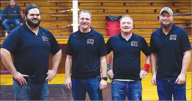  ?? Randy Moll/Westside Eagle Observer ?? Gentry Youth Organizati­on wrestling coaches include Derek McCain, Cody Smith, Lindsey Ryan and Casey Strickland. Youth wrestling is in its second year as a GYO sport.