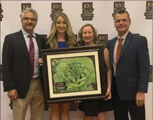  ?? COURTESY PHOTO ?? FROM LEFT: 2016-18 Imperial County Farm Bureau President Jimmy Abatti, Executive Director Brea Mohamed, Executive Assistant Rachel Magos and current Imperial County Farm Bureau President Tom Brundy pose with their County of the Year award at the California Farm Bureau Federation annual dinner last week.