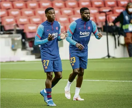  ?? LLIBERT TEIXIDÓ ?? Ilaix Moriba i Samuel Umtiti en una imatge de la temporada passada