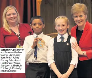  ??  ?? Winner Pupils Steven and Emma with class teacher Clare Casey from P6B St John’s Primary School and First Minister Nicola Sturgeon at The Hub, Edinburgh. Photo by Rob McDougall