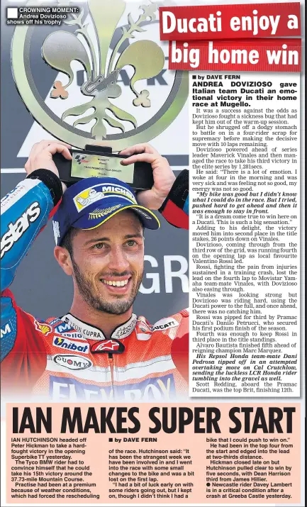  ??  ?? CROWNING MOMENT: Andrea Dovizioso shows off his trophy