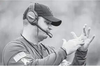  ?? Brett Coomer / Houston Chronicle ?? Seeing something he didn’t like, which was more often than not, Texans coach Bill O’Brien calls a timeout during Sunday’s 33-7 loss to the Rams.