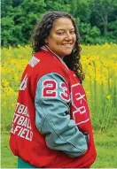  ?? ?? Ebonie Sherwood in her letter jacket. She’s competed her entire high school career in football, girls basketball and track.