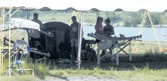  ??  ?? Crews make preparatio­ns for the 135th Royal Canadian Henley Regatta.