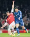  ?? Photo: GETTY IMAGES ?? Stalemate: Olivier Giroud, of Arsenal, and Chelsea’s Eden Hazard battle for the ball during their 0-0 draw at Emirates Stadium in London on Tuesday.