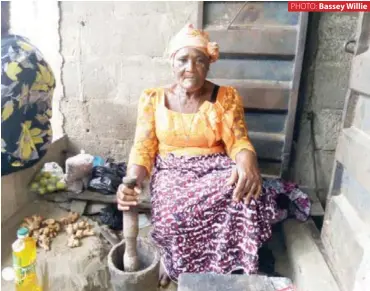  ?? PHOTO: Bassey Willie ?? Mrs Christiana Sunday preparing herbs to be used for womb massage