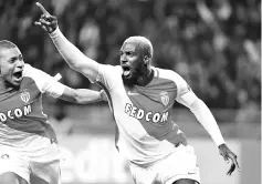  ??  ?? (FILES) This file photo taken on March 15, 2017 shows Monaco’s French midfielder Tiemoue Bakayoko celebratin­g after scoring a goal during the UEFA Champions League round of 16 football match between Monaco and Manchester City at the Stade Louis II in...