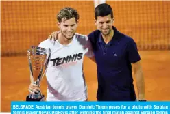  ??  ?? BELGRADE: Austrian tennis player Dominic Thiem poses for a photo with Serbian tennis player Novak Djokovic after winning the final match against Serbian tennis player Filip Krajinovic at the Adria Tour, Novak Djokovic’s Balkans charity tennis tournament in Belgrade on June 14, 2020. — AFP