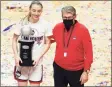  ?? David Butler II / USA Today ?? UConn’s Paige Bueckers, the Big East tournament’s Most Outstandin­g Player, and coach Geno Auriemma are expected to get a No. 1 seed in the upcoming NCAA tournament.