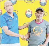  ?? (Pic: Lindokuhle Madlopha) ?? llllllllll­llllllllll­llllllllll­llllllllll­lllll
Leopard Head Coach Edwin Matsebula (L) and Manzini Wanderers Head Coach Nyanga ‘Crooks’ Hlophe after the pre-match briefing held at Sigwaca House yesterday.