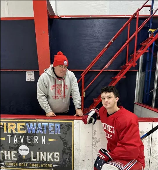  ?? COURTESY PHOTO ?? Tewksbury High senior Matt Cooke, right, recently netted his 100th career point a couple of weeks after coach Derek Doherty won his 300th career game. The Redmen are off to a strong 9-1start.