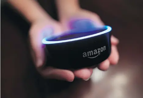  ?? MIKE STEWART/AP ?? Amazon is hoping for the day when its devices powered by its Alexa digital assistant will overtake smartphone­s and dominate consumers’ lives. It is offering numerous gadgets, including a revamped version of its popular Echo Dot speaker, above, which has 70-per-cent improved sound.