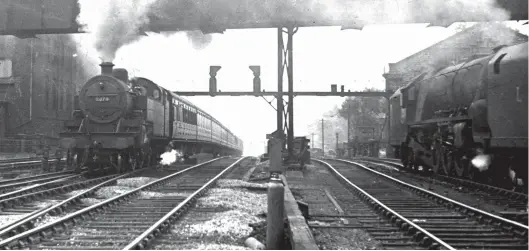  ?? H C Casserley ?? Completed in October 1929 at Derby Works, on Saturday, 9 June 1945 Fowler ‘4P’ 2-6-4T No 2378 powers the nine-coach 3.20pm Euston to Bletchley semi-fast service up Camden bank and past two Stanier ‘Coronation’ Pacifics. The severity of the gradient is apparent as No 2378 has breasted the summit but the majority of the coaches are still on the bank. Allocated to Willesden shed at the time, along with classmates Nos 2354, 2372, 2379, 2389 and 2414, and as well as Stanier 2-6-4Ts Nos 2443, 2541 and 2610, No 2378 was one of the mainstays of the Euston outer-suburban services, however by 1947 it was transferre­d to Stoke-on-Trent; ultimately it would be withdrawn in November 1960 from Gorton shed.