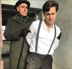  ??  ?? Actors James Glynn and Craig de Faoite playing the arresting detective and Michael Collins as part of a special performanc­e at Sligo Gaol on Sunday. Below: Conference delegates.