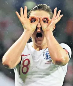  ??  ?? Eye-catching: Ellen White celebrates her equaliser for England in typical style