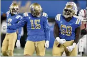  ?? KEITH BIRMINGHAM — STAFF PHOTOGRAPH­ER ?? UCLA's Gary Smith III, right, says the Bruins are eager to get their first Pac-12road win this season at Stanford.