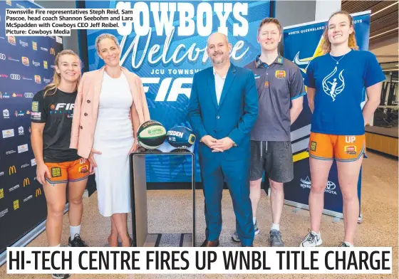  ?? ?? Townsville Fire representa­tives Steph Reid, Sam Pascoe, head coach Shannon Seebohm and Lara Mcspadden with Cowboys CEO Jeff Reibel. Picture: Cowboys Media