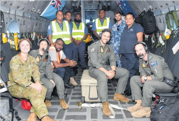  ?? Photo: FELIX LESINAIVAL­U ?? The Royal Australian Air Force with Government officials during a recent demo-operation of a search and rescue mission.